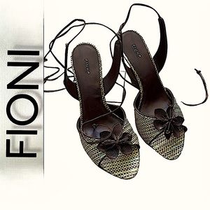 FIONI.NWOT. Fabulous Vegan leather lace up wedge sandals. Mixed woven browns.8.5